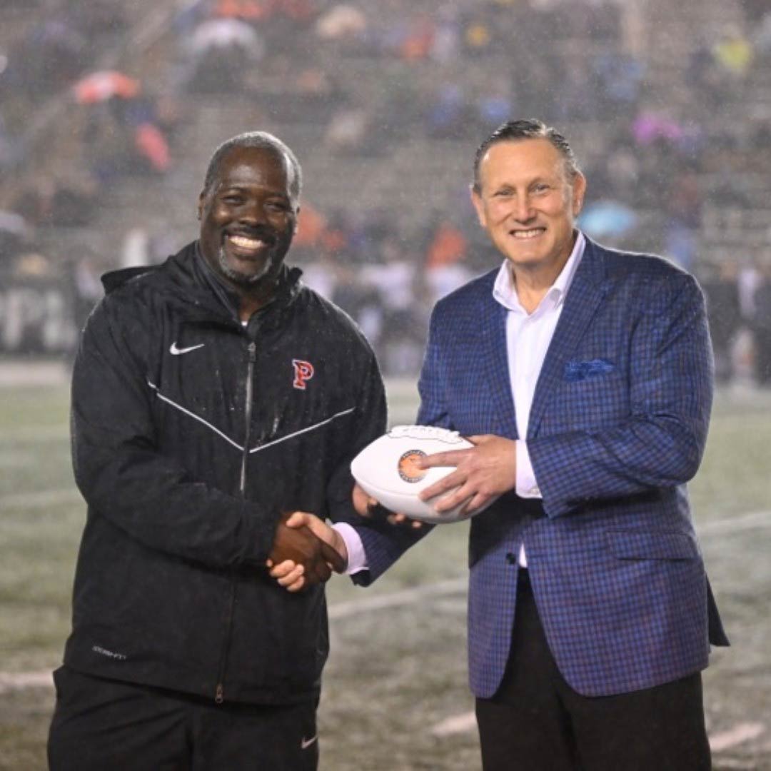 Dr. Marc J. Levine Receives Game Ball at Princeton University Football Game